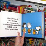 Happiness is one dollar for the movie, 35 cents for popcorn and 15 cents for a candy bar. Happiness is one dollar for the movie, 35 cents for popcorn and 15 cents for a candy bar.
