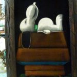 Snoopy on his doghouse