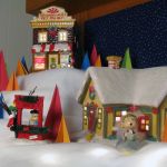 A view of the Pig-Pen's house and the Pet Palace. A view of the Van Pelt's house and the Pet Palace.