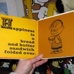 Happiness is a bread and butter sandwich folded over. Happiness is a bread and butter sandwich folded over.