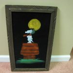 Snoopy Flying Ace on Doghouse