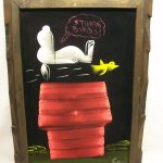 Snoopy on Doghouse Black Velvet Painting