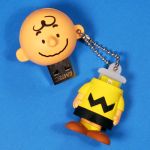 Figural Charlie Brown with drive removed and keychain inserted into head - Peanuts EMTEC USB Drive