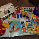 Classic toys, including a Snoopy and Linus puzzle. Classic toys, including a Snoopy and Linus puzzle.