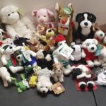 Five Snoopy plushes nestle in with their fellow fluffy creatures. Five Snoopy plushes nestle in with their fellow fluffy creatures.