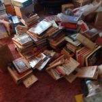 Charlie Brown is desperately looking for the Peanuts books in this pile. Charlie Brown is desperately looking for the Peanuts books in this pile.