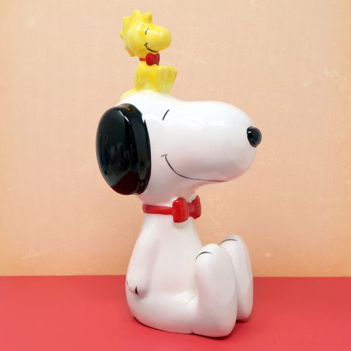 Snoopy sitting with Woodstock on head Bank