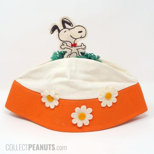 Snoopy dancing in grass with flowers Hat
