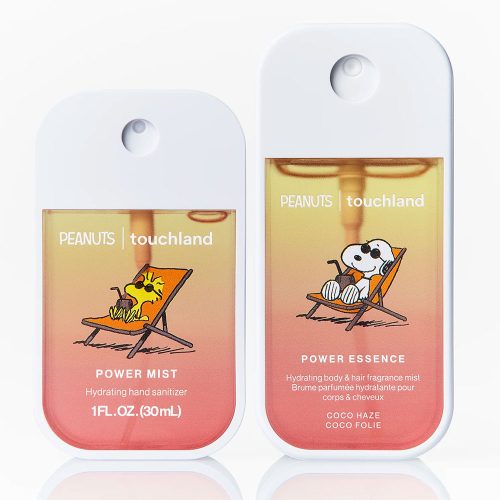 Two Peanuts-themed Touchland bottles on a white background: a smaller peach-colored "Power Mist" hand sanitizer featuring Woodstock lounging in a beach chair, and a larger matching body and hair fragrance mist featuring Snoopy lounging in a beach chair.